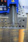 Detailaufnahme der Materialführung der CREA-WHEEL 60 Basic RRM beim Richten verschiedener Stahlprofile.